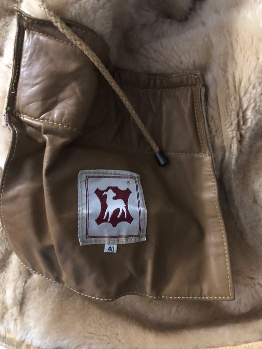 Теплая натуральная дубленка с кап