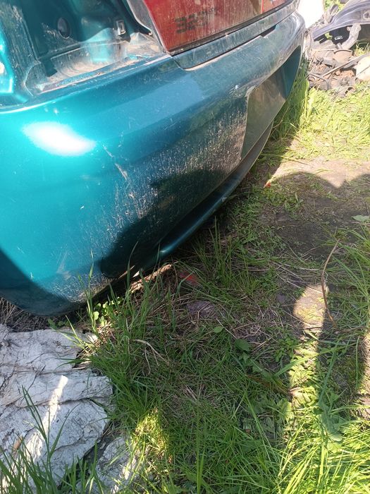 Задній бампер Mazda 323 BA