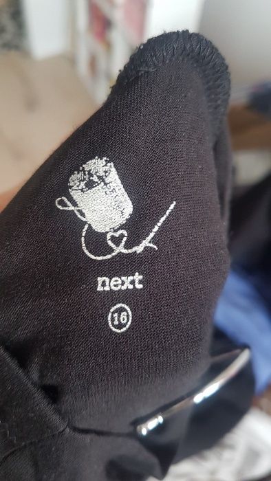 Top bez rękawów gładki ze stójką XL