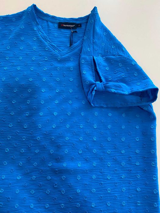 Blusa decote bico tamº L largura 52cm altura 62cm