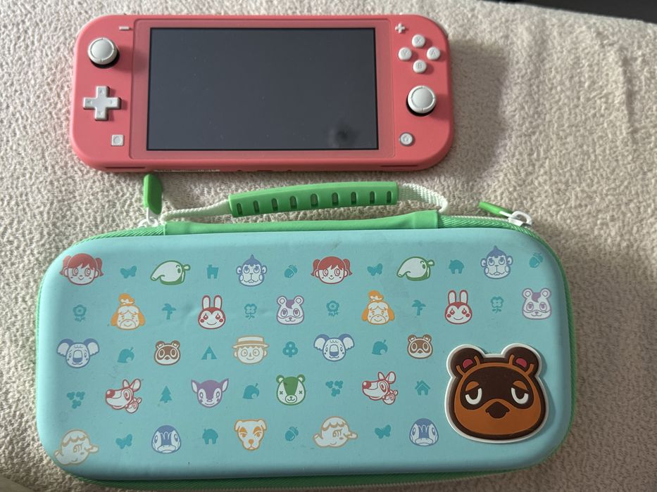 Nintendo Switch Lite Rosa (Como Nova) + 2 Jogos (Mario + Crash) + Capa