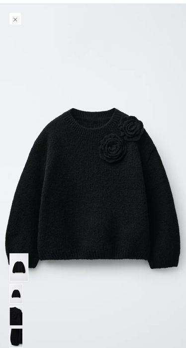 Sweter z dzianiny z kwiatem