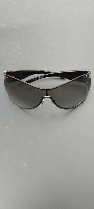 Очки солнцезащитные Gucci.