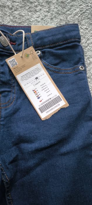 Nowe spodnie jeansowe coccodrillo r. 122