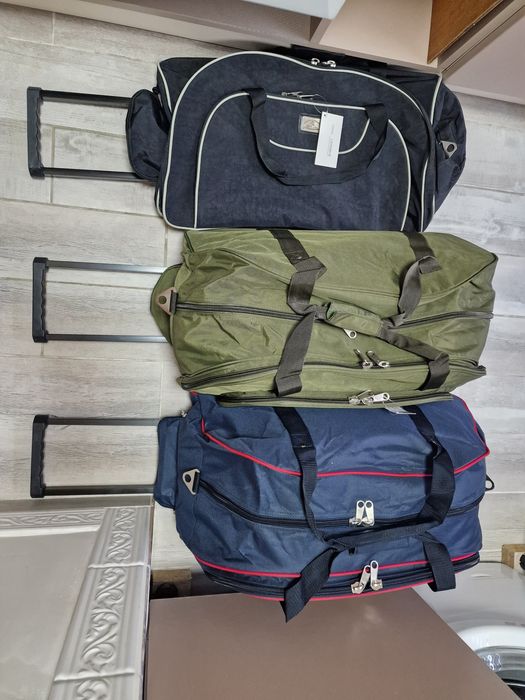 Сумки ручна та на колесах