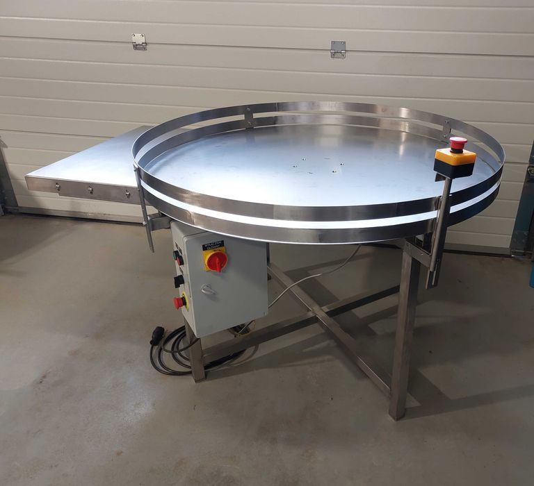 Stół odbiorczy, buforowy, obrotowy