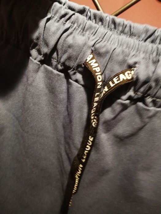 Spodnie z lampasem 5 XL kolor  jeansowy NOWE