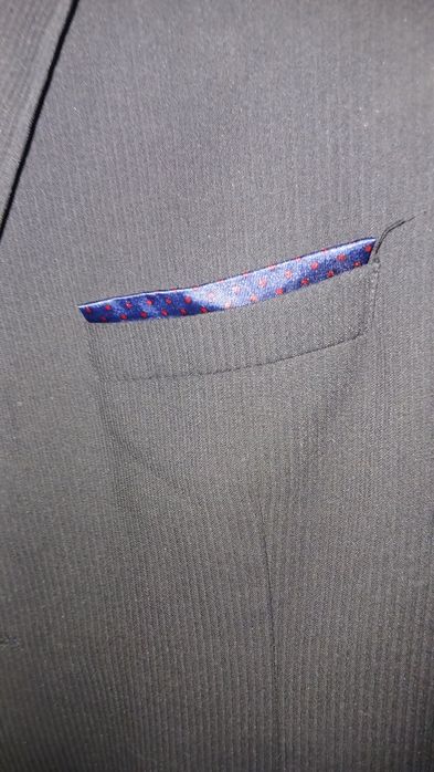Fato azul escuro , calça e casaco