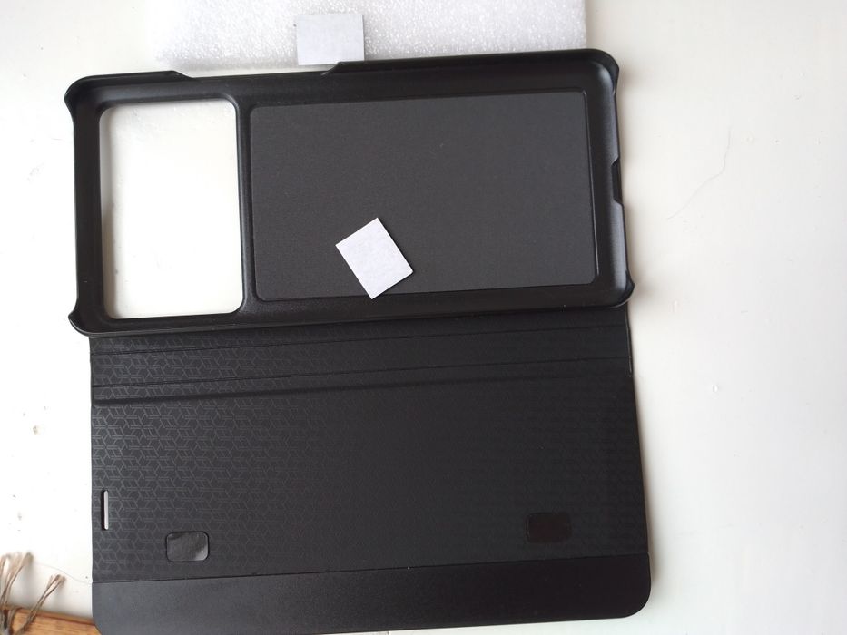 Продам чехол книжка для поко х6про. Новый.