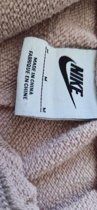 Nike Luźne spodnie dresowe pudrowy róż 38 40 M L