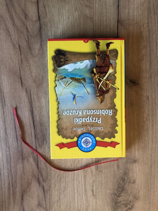 „Przypadki Robinsona Crusoe” z zakładką wstążką