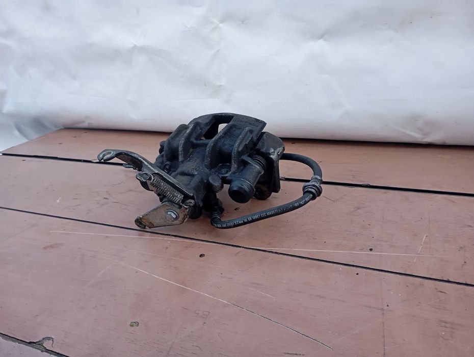 Pinça travão / maxila de travão trás esquerda NISSAN NT400 Cabstar Cha