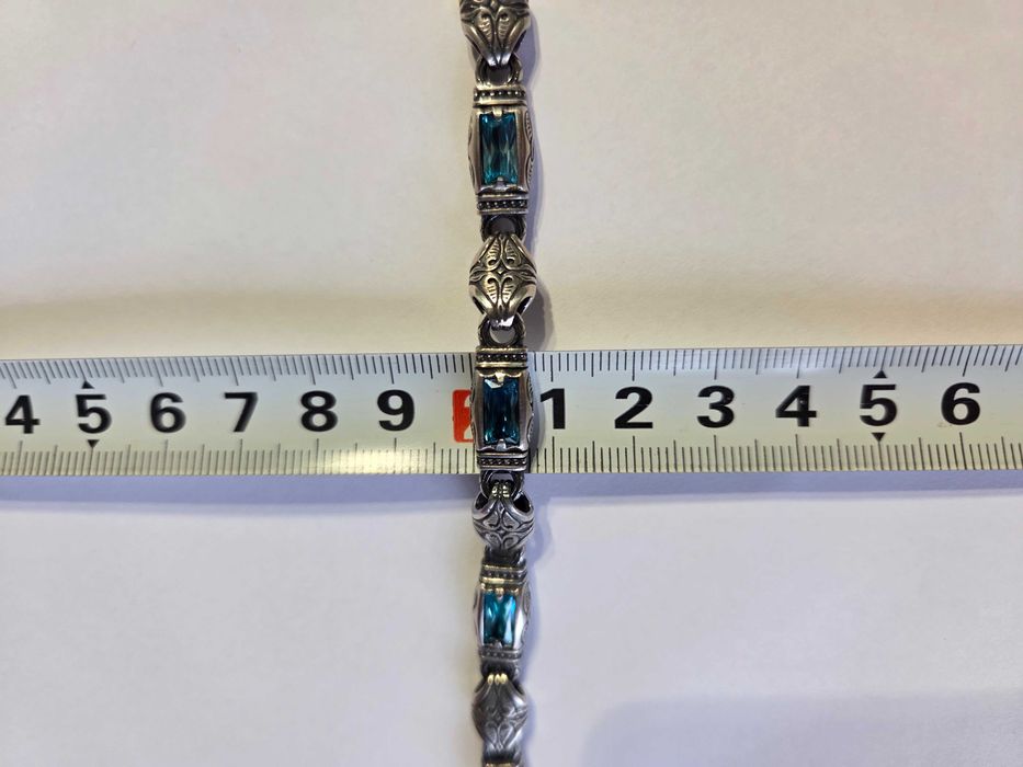 Серебряный браслет мужской с камни.