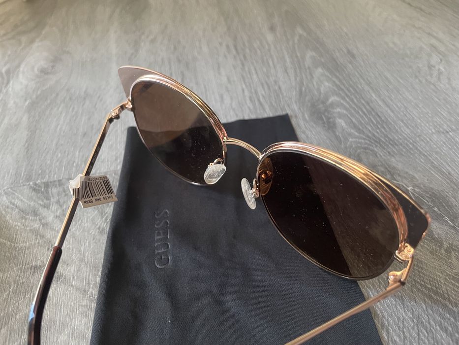 Guess óculos de sol, olho de gato dourados