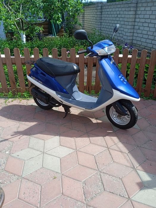 Honda Tact 24 stand up