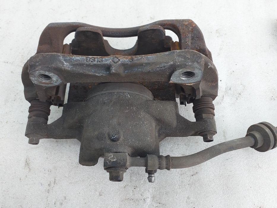 Pinça travão / maxila de travão frente esquerda OPEL Astra J