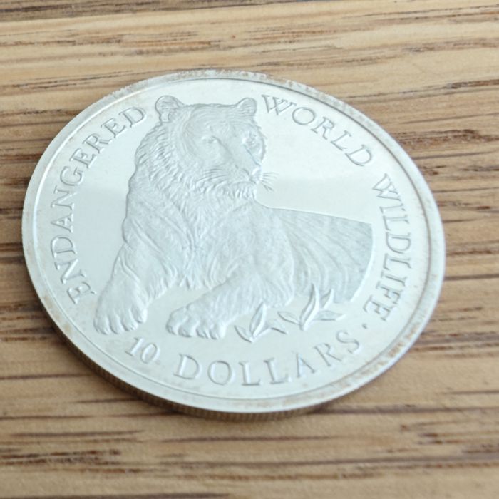 Srebro. 10 dollars 1990  Tygrys. Certyfikat