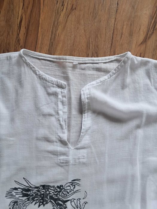 biała bluzeczka lniano bawełniana stan bdb ale ma wadę nadruku. unisex