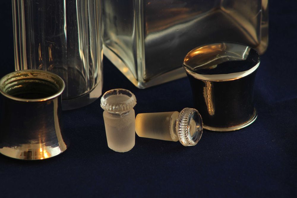 Vintage bottles and small jars, natural-bristle brushes, nail polish and a small box