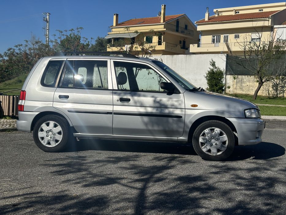 Mazda Demio 1.3 Glx de 1999 a gás