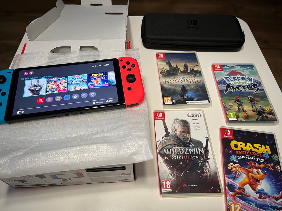 Nintendo Switch OLED –! Prawie NOWY (65h) + 5 hitów + etui twarde