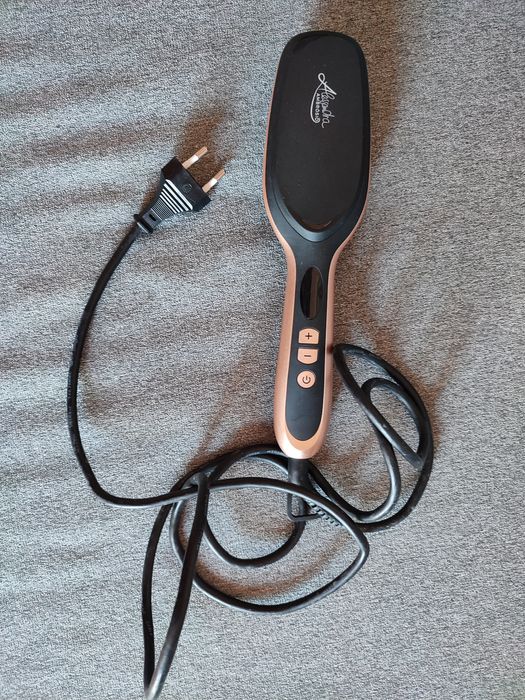 Escova de cabelo elétrica