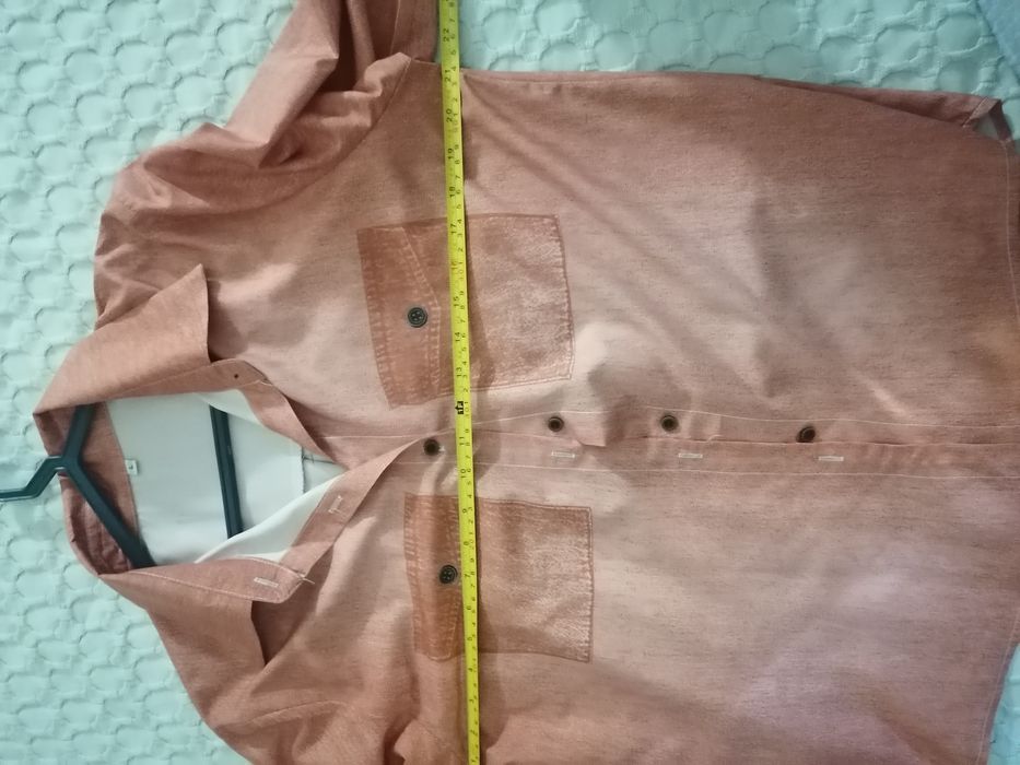 Camisa nova bolsos falsos