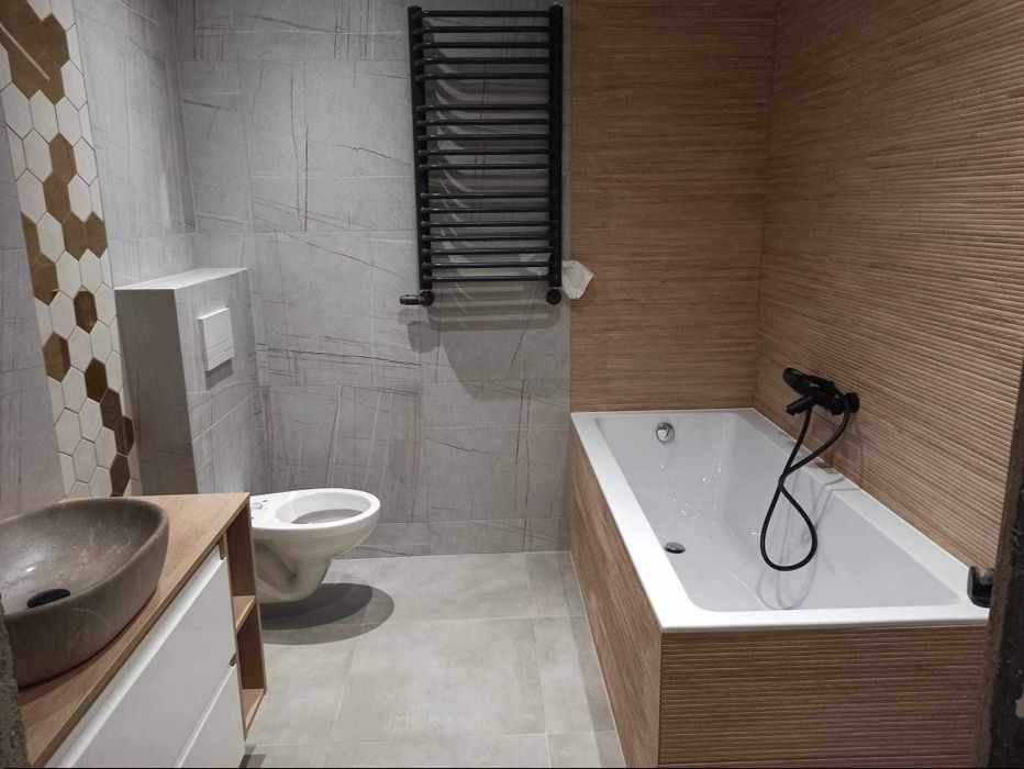 Wykończenia wnętrz - Łazienki - Układanie płytki - Hydraulika