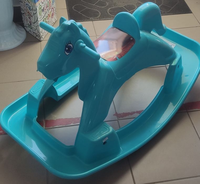 Іграшка гойдалка