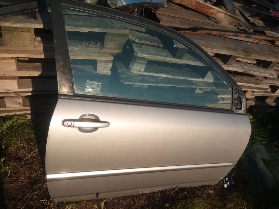 Toyota Corolla E12 3D 02-07 drzwi prawy przód kolor 1K2