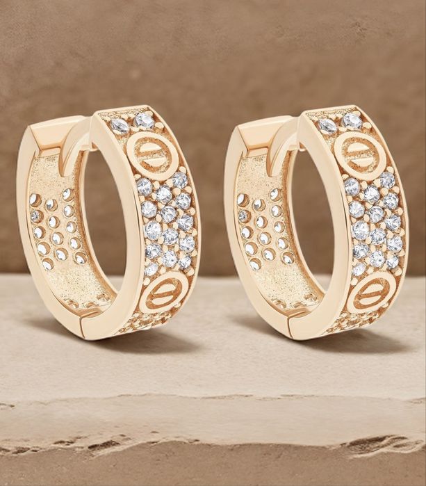 Золоті сережки Cartier Love!