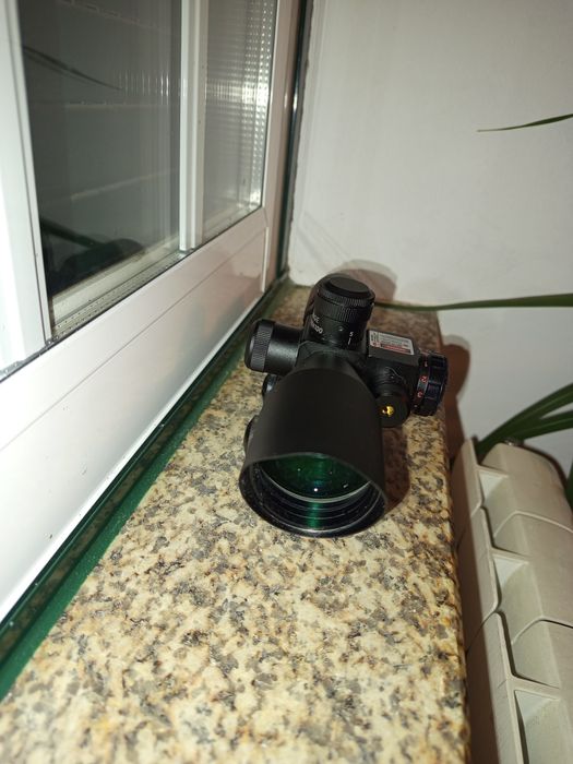 Mira de rifle com laser