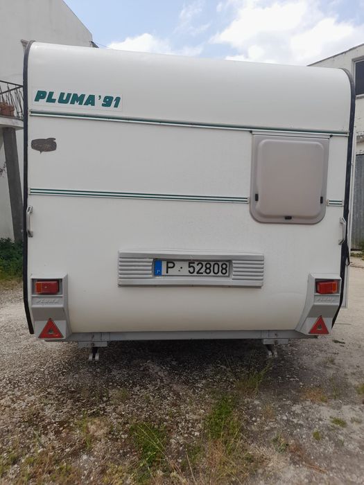 Caravana pluma usada
