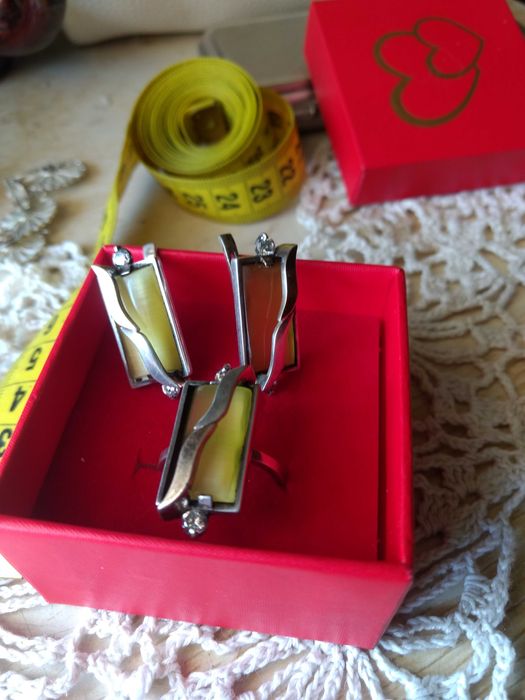 Серебрянные наборы с камнями