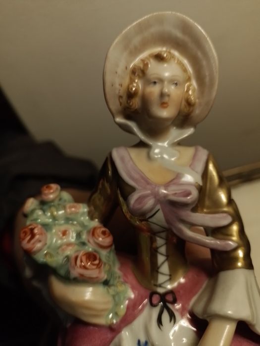 2 estatuetas Artibus