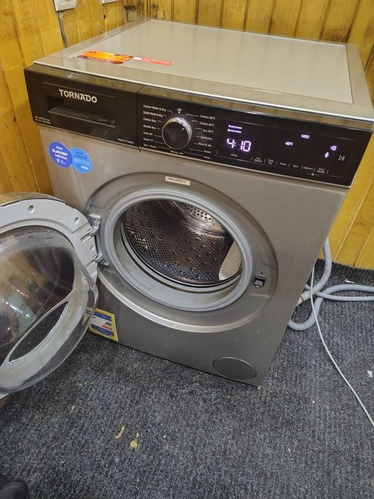 Стирально - сушильна машина Tornado TWV-FN712SLDA
