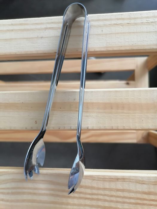 Colher de granel e pinças gelo