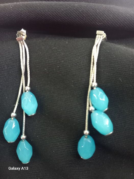 Brincos novos em prata com. Pedra Calcedónia azul