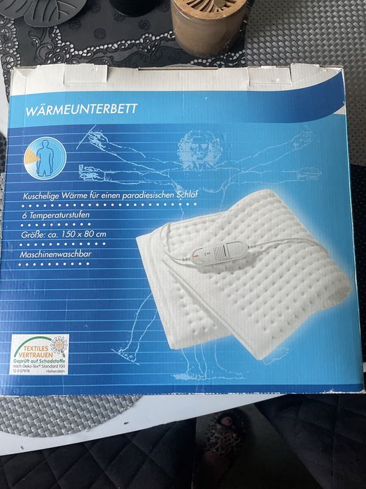 Elektryczna               nakladka ba łózko
