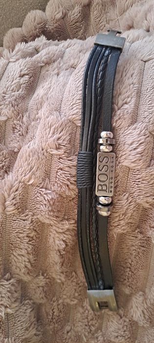 Pulseiras de homem em couro e aço