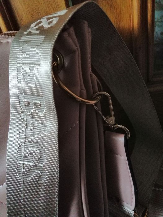 Listonoszka pudrowy roż