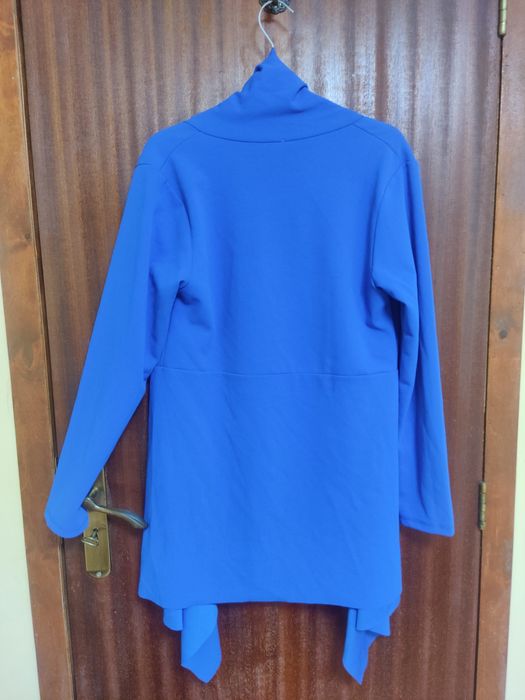 Casaco de licra extensível.