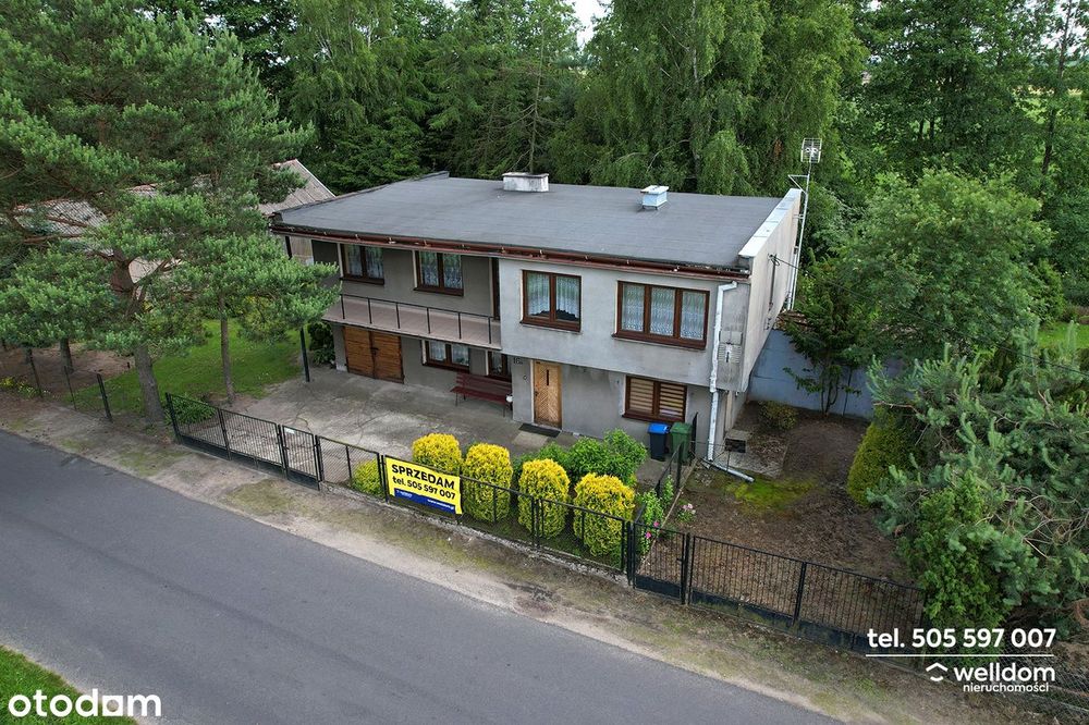 Dom z ogrodem z dala od miejskiego zgiełku.