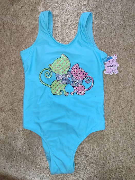 Суцільний купальник для дівчинки