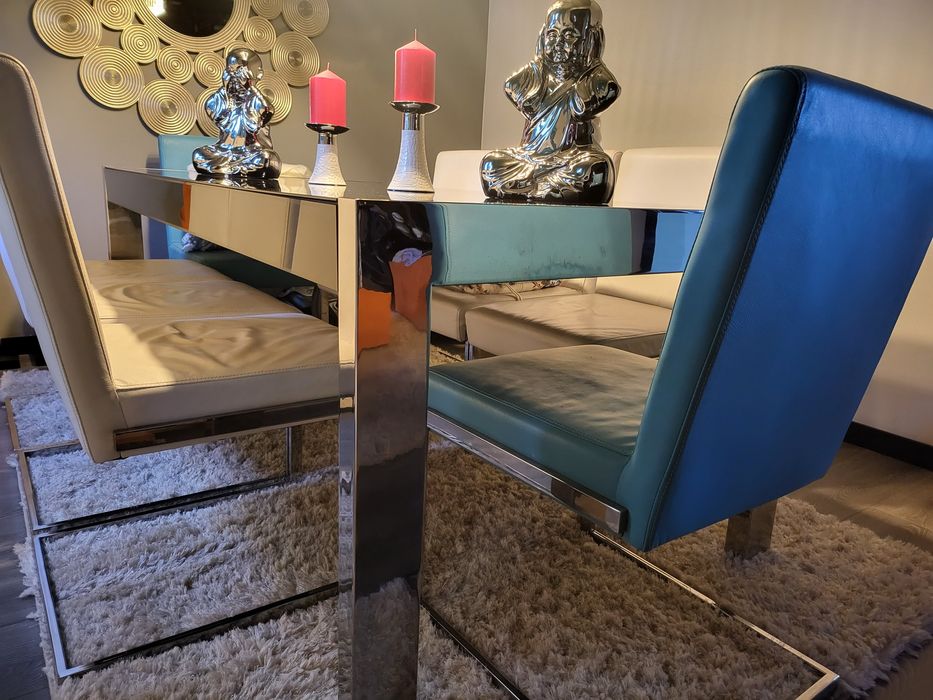 Mesa jantar aço inox com 8 cadeiras em aço inox e pele