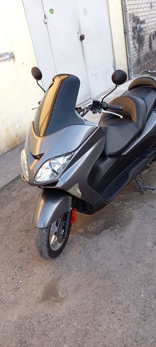 Продам максі скутер honda forza .