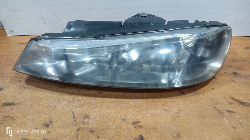 Farol Peugeot 406 ótica 2002 esquerda