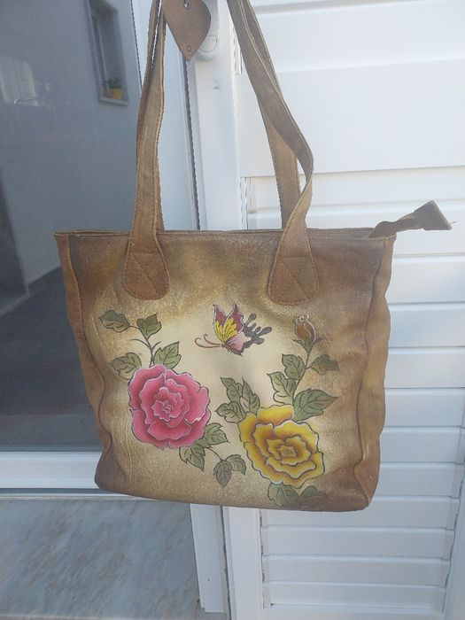 Mala de mulher em pele