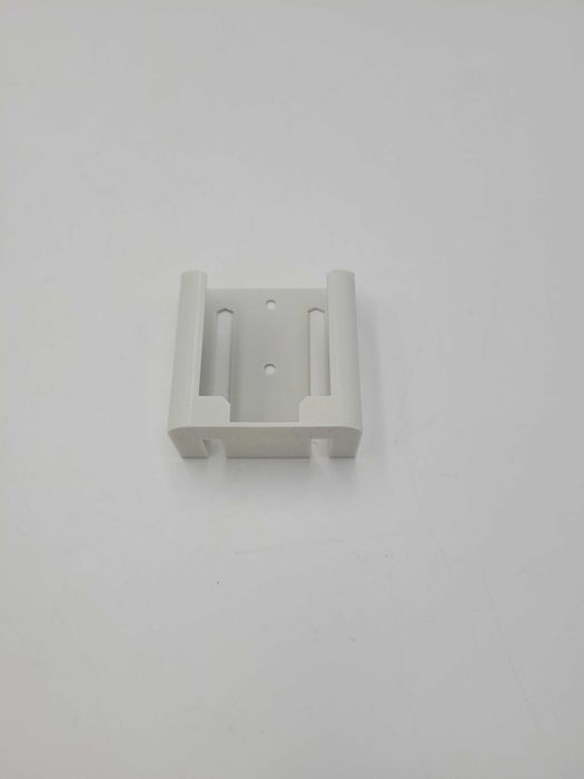 Uchwyt ścienny do pilota Sinclair