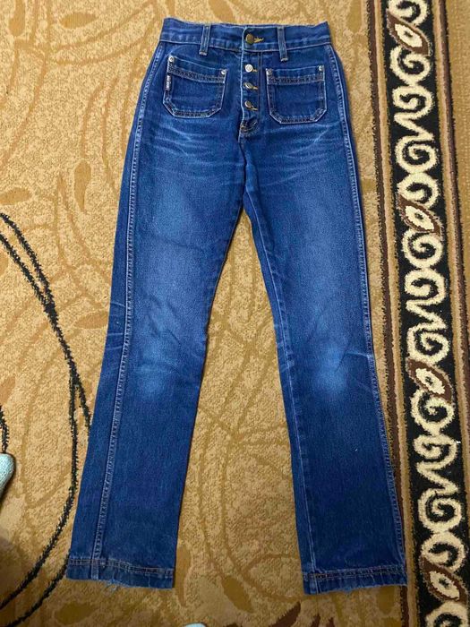 Фирменные джинсы на девочку 42-44 размер.